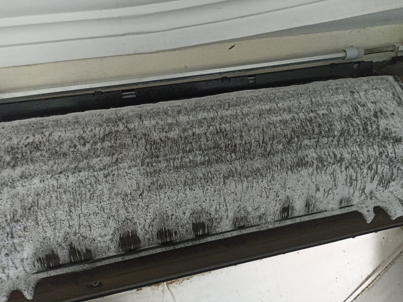 Arctic Star servicing an aircon unit in Pasir Ris